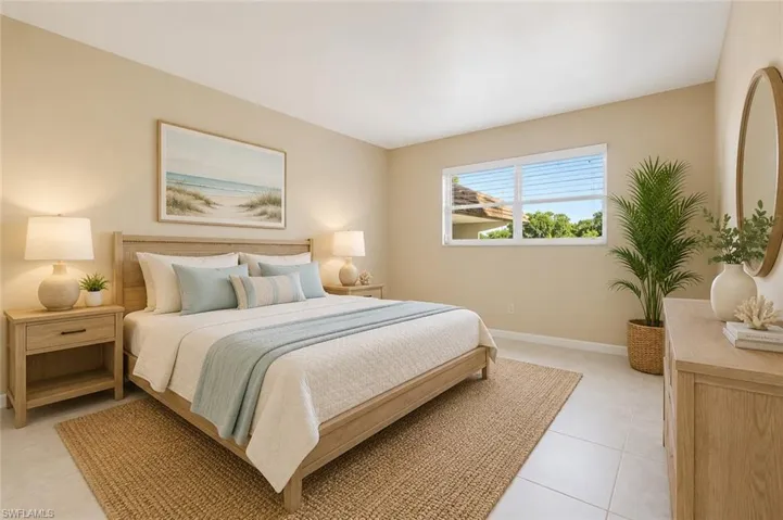 Spacious room with a large window, light tile flooring, and neutral wall tones