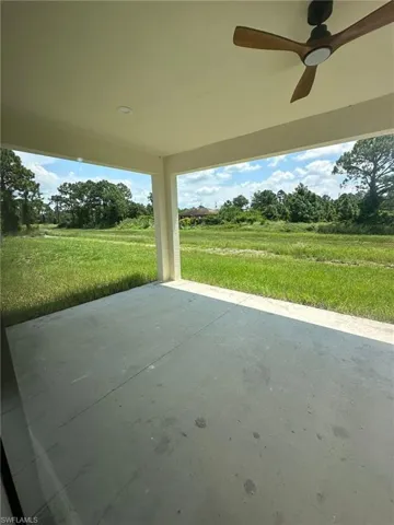 View of patio with ceiling fan