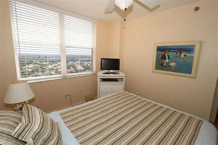 Bedroom with carpet and ceiling fan