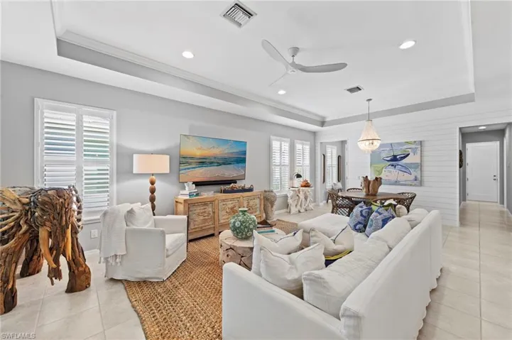 The tile floor extend throughout the public areas. New CEILING FAN (January 2022), new SMART HOME AUTOMATION SYSTEM (August 2021), new PLANTATION SHUTTERS (2019)