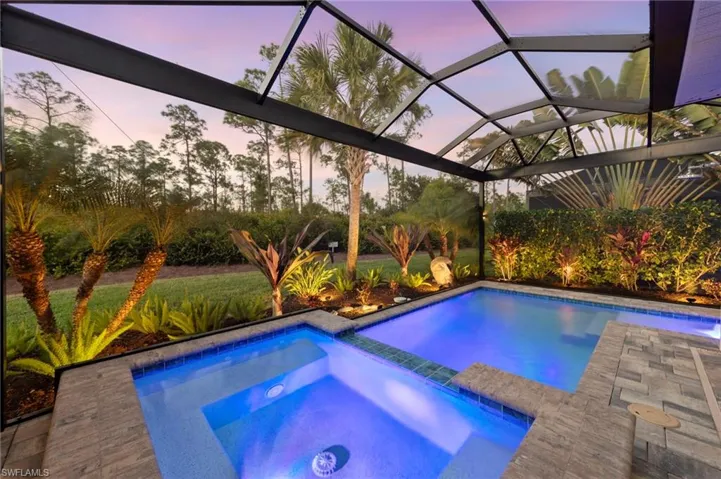Enjoy the pool and hot tub at night with the privacy and lighting.