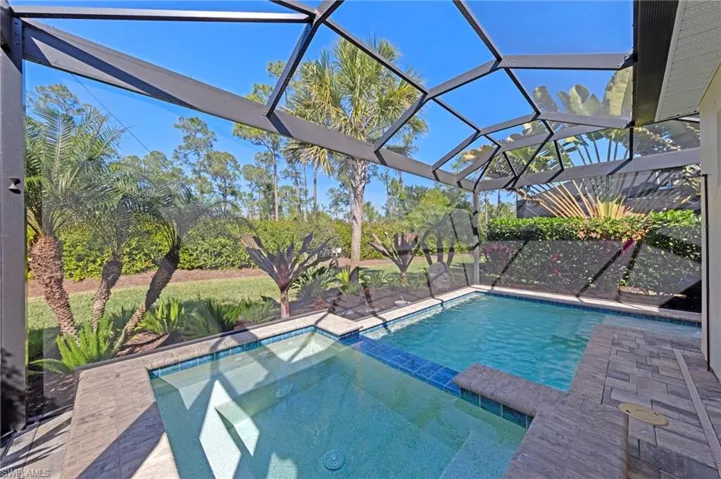 Lush landscaping provides total privacy around the pool/lanai area. UPGRADED POOL PUMP (August 2025), New SALT TURBOCELL (March 2025)