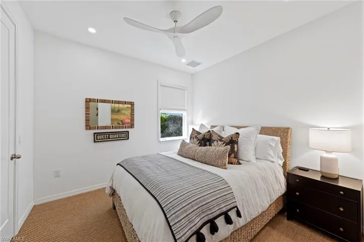Fully loaded secondary bedroom. New added CAN LIGHTING (September 2023), new SISAL CARPET (February 2022), new CEILING FAN (January 2022), new WINDOW BLINDS (November 2021), new TV MOUNT & RAISED OUTLET (November 2021)