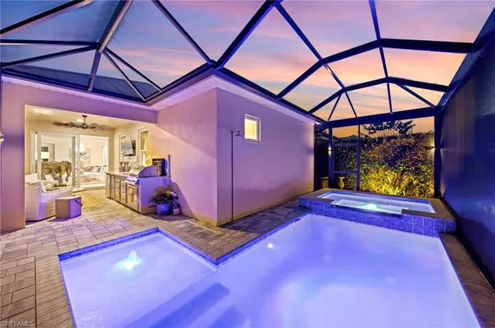 Long list of CUSTOM UPGRADES includes the extensive landscaping around the home, with LANDSCAPE LIGHTING, pool/spa, outdoor kitchen and EXTENDED LANAI. New POOL LIGHTS (November 2025)