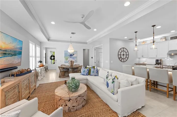 The OPEN FLOOR PLAN is perfect for entertaining. The inviting entry has a large STORAGE CLOSET WITH CUSTOM SHELVING. Great room with TRAY CEILING & CROWN MOLDING. New CEILING FAN (January 2022), new DIMMER SWITCHES throughout the home (November 2021), new INTERIOR PAINT throughout the home (August 2021), new SHIPLAP DINING WALL (April 2021)