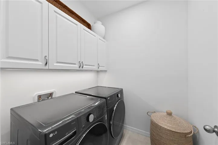 Light and bright laundry. New LG WASHER & DRYER (December 2023), new UNDER CABINET LIGHTING & added CAN LIGHTING (September 2023), new LAUNDRY CABINETS (August 2021)
