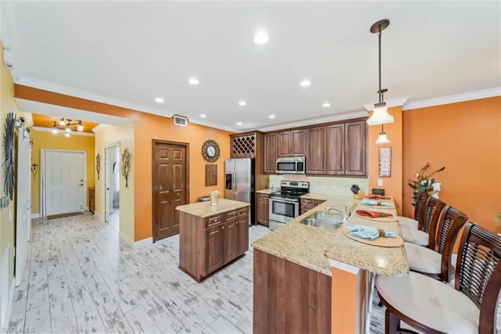 10029  Heather  LN, Naples, FL 34119