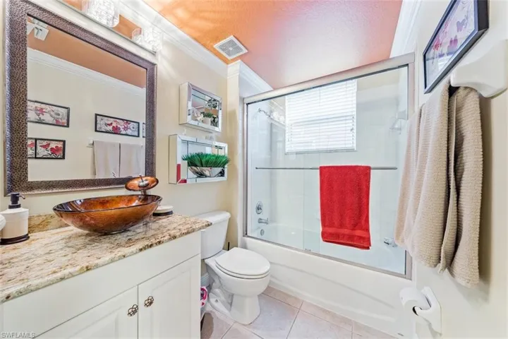 10029  Heather  LN, Naples, FL 34119