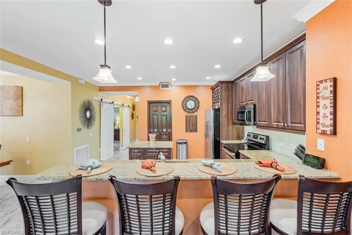 10029  Heather  LN, Naples, FL 34119