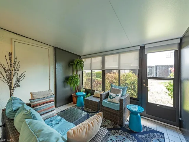 Sunroom / solarium with a wealth of natural light