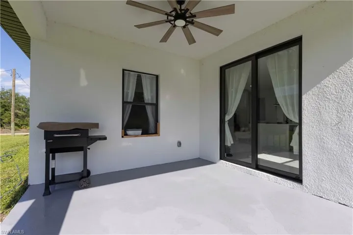 View of patio / terrace with ceiling fan
