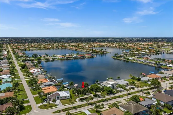 Welcome to 5028 Pelican Blvd with Amazing Long Lake Views over the famous 8 Lakes