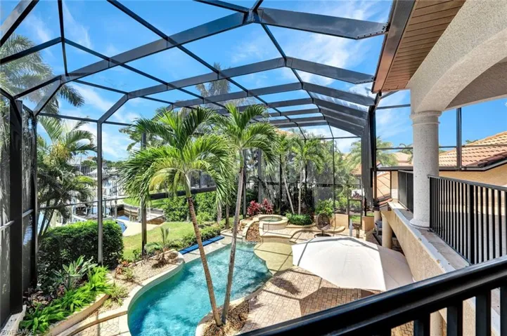 View from balcony of swimming pool and lanai