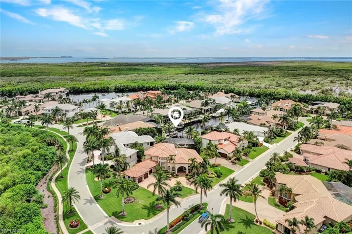 Aerial view of home and waterway
