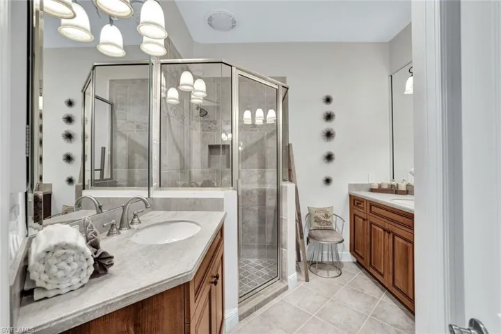 2nd story master bathroom with shower and dual vanities