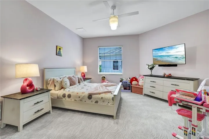 4th Bedroom featuring large walk in closet and ensuite bathroom