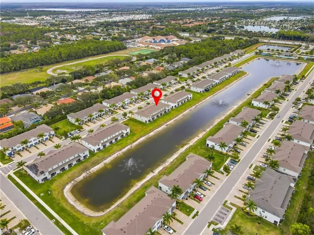Aerial view of residential area with a large body of water