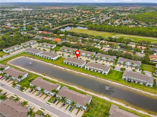 Aerial view of residential area with a large body of water
