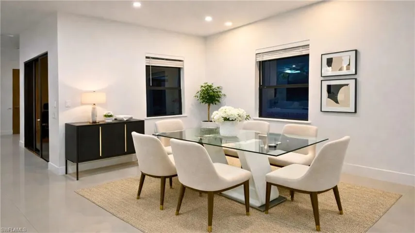 Virtually Staged  Dining room with baseboards and recessed lighting