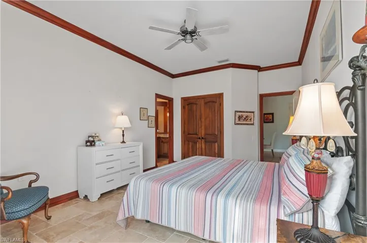 Master bedroom with a walk in closet