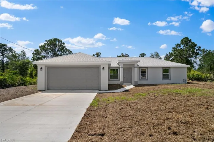 Single story home with a garage