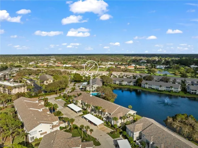 Birds eye view of the condo location featuring a water view
