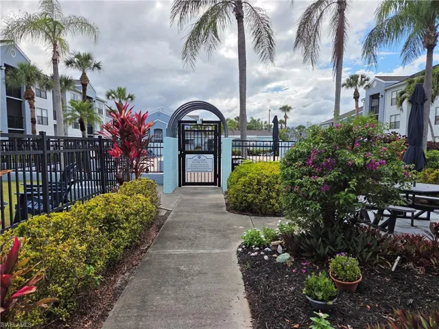 View of property's community with a gate
