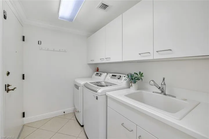Washroom / laundry room to Service Elevator and Trash Shoot