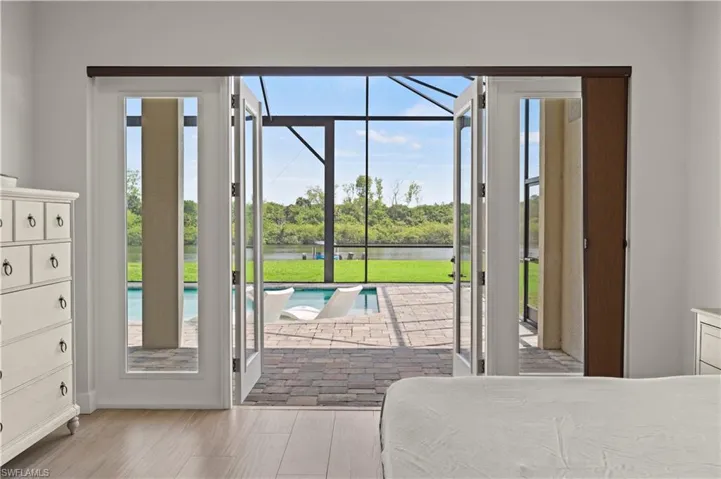 french doors that open to a screened lanai
