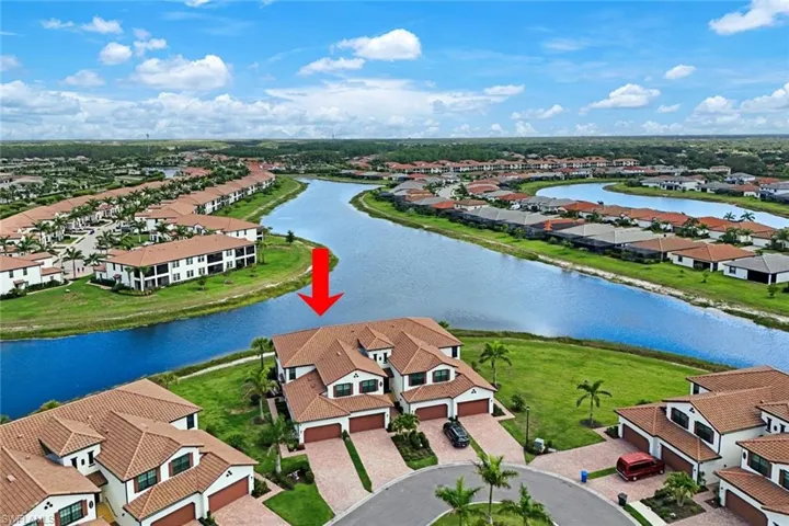 Aerial view of residential area with a nearby body of water