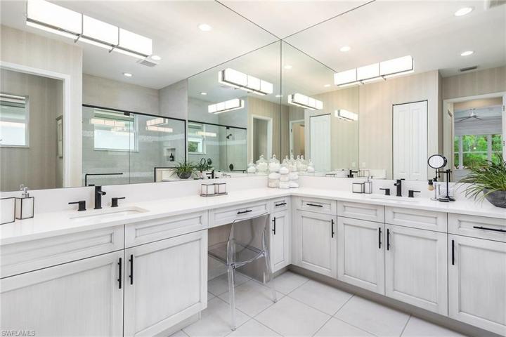Master Bathroom with dual sinks, walk in shower.