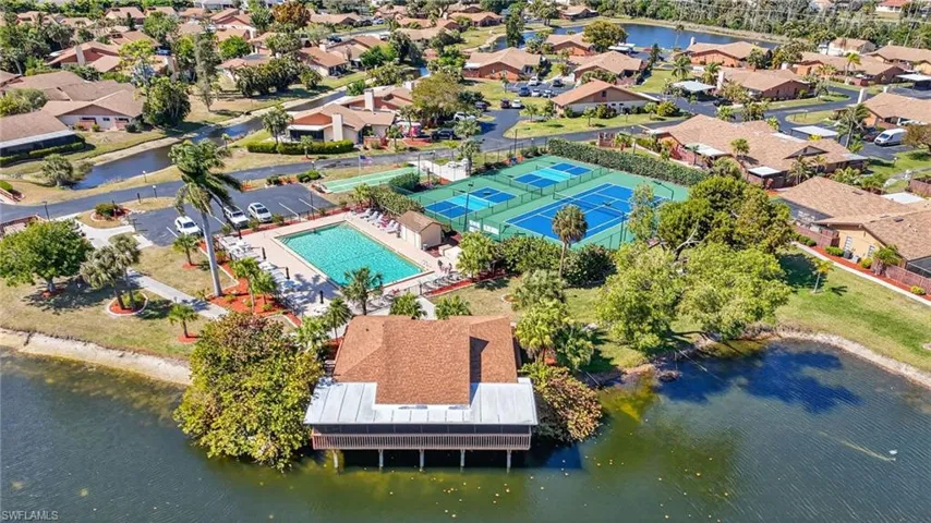 Aerial view of residential area with a nearby body of water