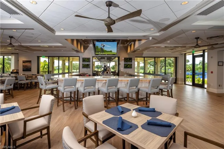 Dining space featuring light hardwood / wood-style floors, ceiling fan, and french doors