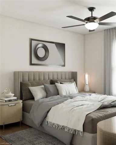 Bedroom with dark hardwood / wood-style floors and ceiling fan