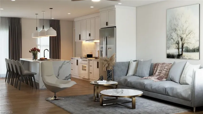Living room with dark hardwood / wood-style floors, sink, and ceiling fan