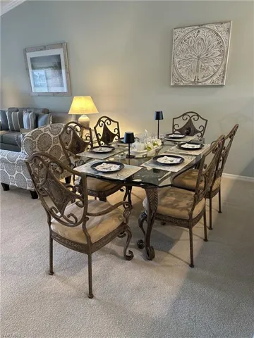 View of carpeted dining space