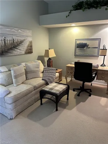 Living room featuring carpet