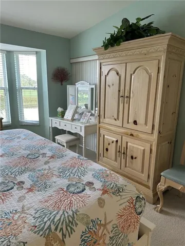 Bedroom with carpet flooring