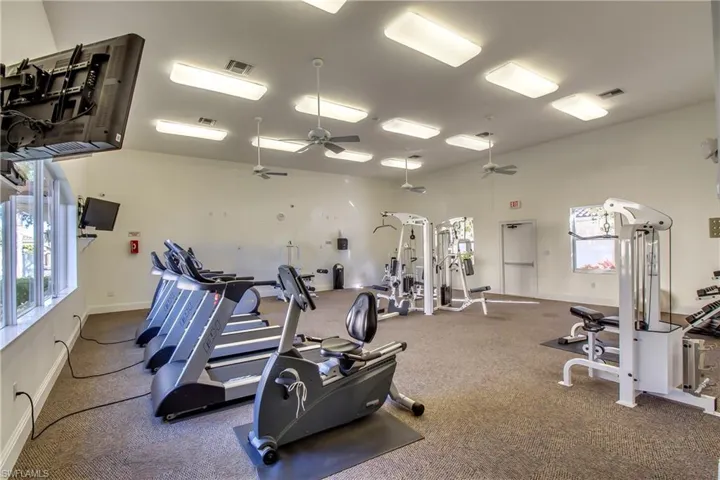 Exercise room with ceiling fan