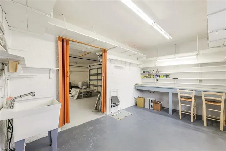 Versatile extra storage room off the garage—perfect for tools, beach gear, or a private workshop.