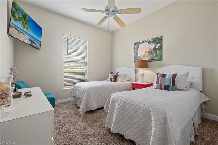 Bedroom featuring carpet flooring and ceiling fan