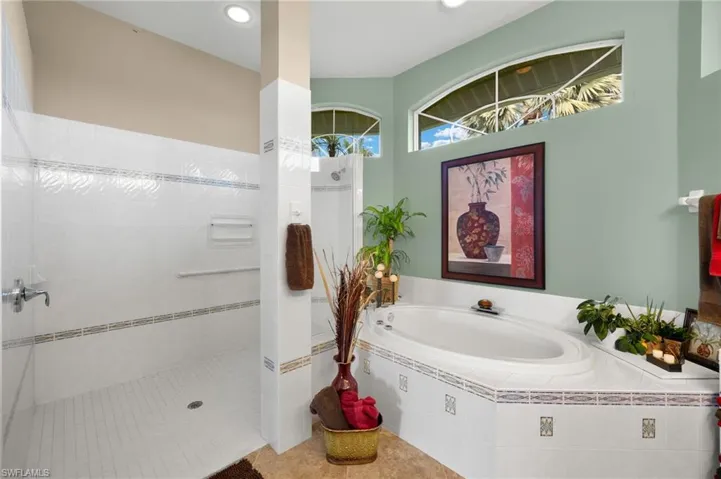 Spacious bathroom with separate shower and soaking tub