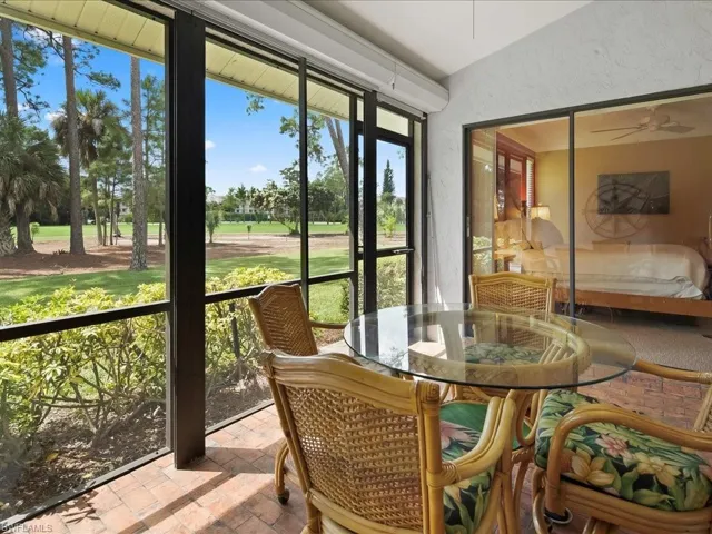 Lanai overlooks par 4 Hole #6 of the Blue Course.  There are electric storm shutters for peace of mind when you are away.