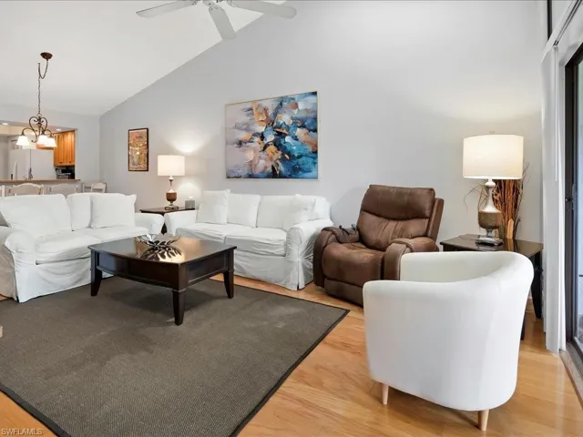 Living room opens directly out to the screened lanai.