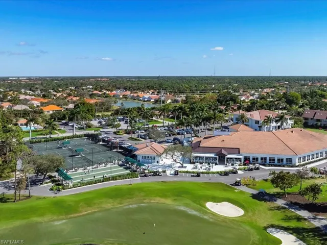 Aerial view of Foxfire clubhouse, outdoor dining with fire pits, tennis and bocce and half-way house.