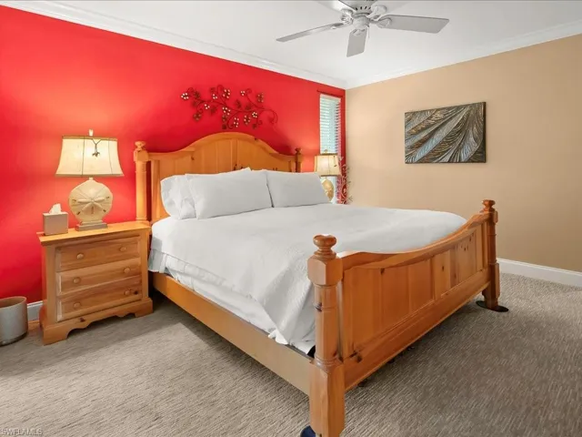 Primary bedroom has hurricane rated window and an en-suite bath.