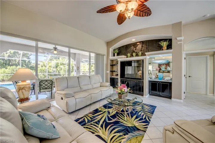 Tiled living room with ceiling fan