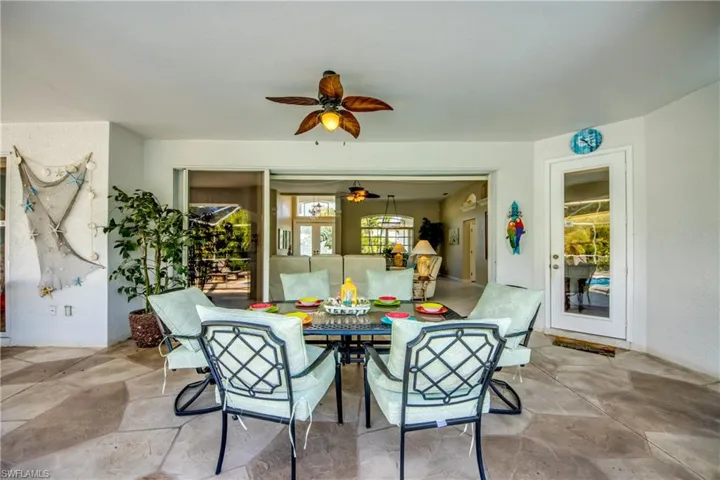 Tiled dining area with ceiling fan