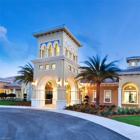 Mediterranean / spanish home with stucco siding and a tiled roof