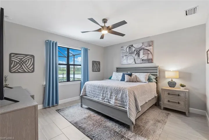 Bedroom featuring baseboards and a ceiling fan